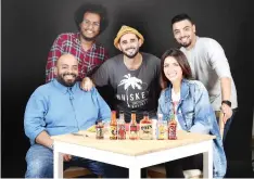  ??  ?? Nahar Alhamrani (center) on the set of his YouTube hit show ‘N8n8a.’ (images courtesy of Nahar Alhamrani)