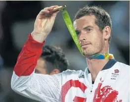  ??  ?? Andy Murray celebrates with his Rio Olympic gold medal.