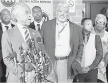  ?? JERRY JACKSON / BALTIMORE SUN ?? The Rev. Al Sharpton, at microphone­s, joinning Michael S. Steele, former Maryland lieutenant governor, speaks in Baltimore about President Donald Trump’s remarks about U.S. Rep. Elijah Cummings and the 7th congressio­nal district.