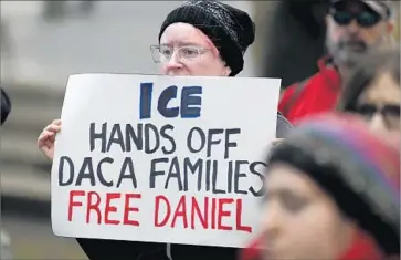  ?? Ted S. Warren Associated Press ?? PROTESTERS GATHERED Friday outside federal court in Seattle where a hearing was held for Daniel Ramirez Medina, who is fighting deportatio­n. The judge ordered an immigratio­n court bond hearing this week.
