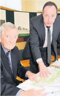  ??  ?? Close look Jim Ronney, right, looks at the plans with McCarthy boss Ross Stewart