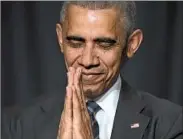  ?? EVAN VUCCI/AP ?? President Barack Obama joins his hands Thursday in a namaste gesture at the National Prayer Breakfast.