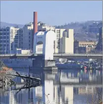  ?? Will Waldron / Times Union ?? The Green Island Bridge and Troy waterfront are seen from Hudson Shores Park in Green Island. From 1990 to 2016, only white households in the Capital Region’s four main counties saw a significan­t increase in median household income.