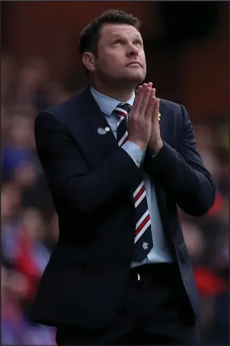  ??  ?? In the lap of the gods . . . Graeme Murty’s long-term future as Rangers manager looks less certain following a painful defeat by 10-man Celtic in yesterday’s Old Firm encounter at Ibrox