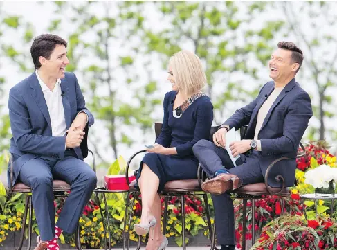  ?? AARON LYNETT / THE CANADIAN PRESS ?? Prime Minister Justin Trudeau speaks with Kelly Ripa and Ryan Seacrest on Live with Kelly and Ryan in Niagara Falls, Ont., on Monday.