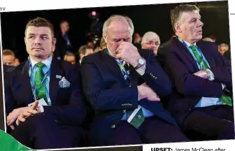  ??  ?? UPsET: James McClean after Ireland’s defeat and, above, Brian O’Driscoll and the IRFU’s Philip Orr and Philip Bromwell react to the failure to win the rugby bid