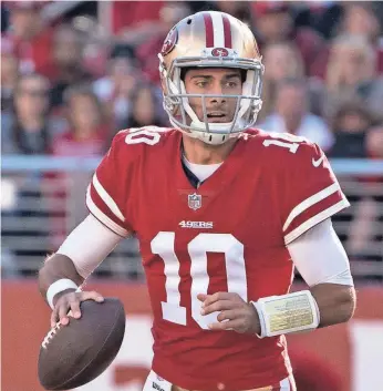  ??  ?? Jimmy Garoppolo has led San Francisco to three consecutiv­e wins after the 49ers started 1-10. He appears to be a great fit in coach Kyle Shanahan’s offense.