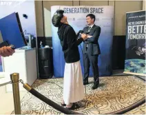  ?? Antonie Robertson / The National ?? Abu Dhabi Secondary School student Majid Senbol, 16, explores Mars with virtual reality goggles.