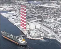  ?? ANDREW VAUGHAN/THE CANADIAN PRESS ?? The Tufts Cove Generating Station in Dartmouth, N.S. Canadians could come out ahead financiall­y with a federally-imposed carbon tax, according to the latest study on the policy.