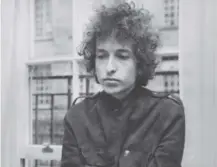  ??  ?? 0 On this day in 1966 Bob Dylan was booed by British folk fans for performing on stage with an electric guitar