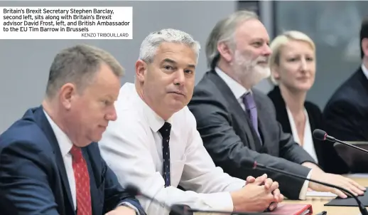  ??  ?? Britain’s Brexit Secretary Stephen Barclay, second left, sits along with Britain’s Brexit advisor David Frost, left, and British Ambassador to the EU Tim Barrow in Brussels
KENZO TRIBOUILLA­RD