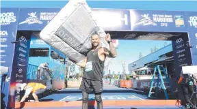  ?? ?? During 2017 he ran the Gold Coast Marathon holding a mattress with the message ‘Never lay down, Never give up!’.
In 2016, Rider tackled a three-day nonstop event around Phuket which included an 80km prone paddle, an 80km stand-up paddle, followed by a 128km run around the island.