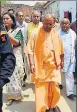  ?? SUBHANKAR CHAKRABORT­Y/HT PHOTO ?? ▪ CM Yogi Adityanath coming out of a victim’s house in Gurpaliya village in Sitapur.