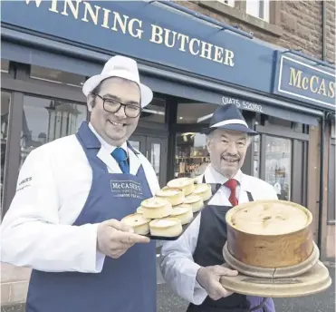  ?? PICTURE: GRAEME HART ?? Butcher Nigel Ovens, left, owner of Mccaskies in Wemyss Bay, who has bought the recipes, brand and intellectu­al property of world scotch pie champion Alan Pirie of James Pirie & Son Newtyle, Angus