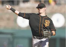  ?? Tim Warner / Getty Images ?? Christian Arroyo has played in 13 games for the Giants this spring, going 4-for-15 with two RBIs.