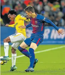  ?? Picture: GALLO IMAGES ?? BIG BUCKS: Mamelodi Sundowns’ Percy Tau, trying to hold off Barcelona’s J Cuenca, is on the brink of signing for an English Premier League side.