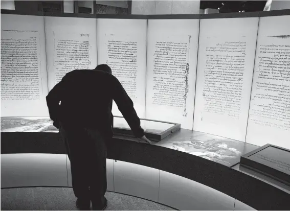  ?? Saul Loeb / AFP / Getty Images ?? The Museum of the Bible announced recently that five artifacts thought to be fragments of the Dead Sea Scrolls are fake and will no longer be displayed.