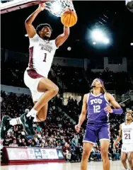  ?? ?? Mississipp­i State’s Tolu Smith (1) dunks against TCU. (Photo by Mike Mattina, MSU Athletics, for Daily Times Leader)