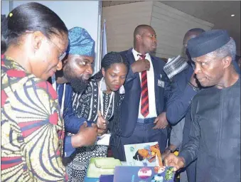  ?? ?? Vice President, Prof Yemi Osinbajo with other guests at the NewGlobe exhibition stand during the 28th Nigerian Economic Summit (#NES28) held in Abuja... recently