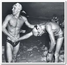  ??  ?? Dean Mercer shakes hands with Trevor Hendy after a tough race to win the 1989 Australian ironman title..