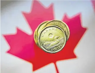  ?? REUTERS ?? The Canadian dollar’s outlook could get better, a Reuters poll has found.