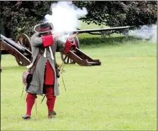  ?? Rick Steves’ Europe/PAT O’CONNOR ?? Get a bang out of the musket loading and firing demonstrat­ion and see cavalry combat in full gallop at Ireland’s Battle of the Boyne site.