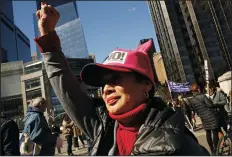  ?? CAROLYN COLE/LOS ANGELES TIMES ?? On Internatio­nal Women’s Day, about 50 people gather on the edge of Central Park in New York to voice their opposition to the current administra­tion policies.