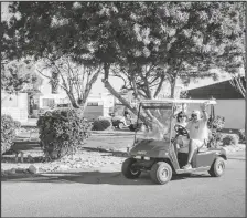  ?? LOANED PHOTO ?? WINTER RESIDENTS TAKE A RIDE around the Friendly Acres RV Resort, 2779 W. 8th St.