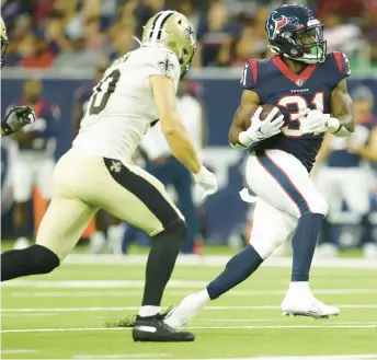  ?? MATT PATTERSON/AP ?? Texans running back Dameon Pierce carries the ball during a preseason game against the Saints on Aug. 13 in Houston.