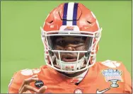  ?? Icon Sportswire via Getty Images ?? Clemson quarterbac­k Taisun Phommachan­h warms up before the Allstate Sugar Bowl College Football Playoff Semifinal against Ohio State on Jan. 1 in New Orleans.