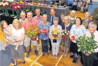  ??  ?? Some of the winners at Burbage Gardening Club show. Picture: Jim Tomlinson