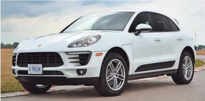  ??  ?? The 2017 Porsche Macan’s 2-liter four-cylinder model is turbocharg­ed, and has 252 horsepower and 273 foot-pounds of torque.