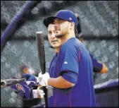  ?? CHARLES REX ARBOGAST/THE ASSOCIATED PRESS ?? Chicago Cubs stars Anthony Rizzo, left, and Kris Bryant wait for their turn in the batting practice cage before Game 1 of the National League Division Series against the San Francisco Giants on Oct. 7 in Chicago.