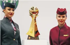  ??  ?? DOHA: The cup of the friendly football match between FC Barcelona and Saudi’s Al-Ahli is displayed during a press conference in Doha yesterday, on the eve of the match. — AFP