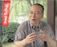  ?? AP FILE PHOTO ?? Liu Xiaobo speaks during an interview at a park in Beijing, China, in July 2008.