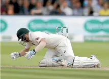  ?? GETTY IMAGES ?? Steve Smith falls to the ground after being struck on the neck by a delivery from England quick Jofra Archer.