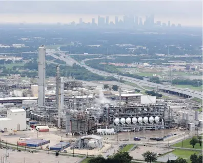  ??  ?? Aerial photo shows the flooded Flint Hills Resources oil refinery near downtown Houston Tuesday.