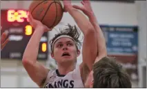  ?? RICK SILVA – RED BLUFF DAILY NEWS ?? Pleasant Valley’s Luke Kremer shoots over Chico’s Odin Nielsen in the Vikings and Panthers final regular-season game on Friday at Pleasant Valley in Chico. Kremer and the Vikings defeated the Panthers 53-36.