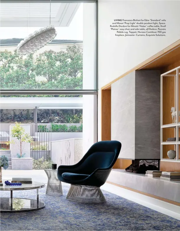  ??  ?? LIVING Francesco Binfaré for Edra ‘Standard’ sofa and Moooi ‘Prop Light’ double pendant light, Space. Rodolfo Dordoni for Minotti ‘Huber’ coffee table, Knoll ‘Platner’ easy chair and side table, all Dedece. Pezzato Pebble rug, Tappeti. Horizon Cantilever 700 gas fireplace, Jetmaster. Curtains, Exquisite Solutions.