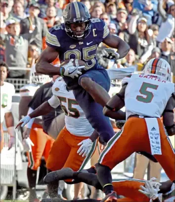  ?? Matt Freed/Post-Gazette photos ?? Jester Weah and his Pitt teammates mostly ran over a Miami team that was No. 2 in the Associated Press Top 25 when it and its fans arrived at Heinz Field a year ago. Pitt beat the Hurricanes, 24-14, that day. The Hurricanes are just 6-8 since then.