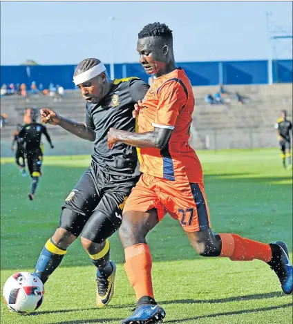  ?? Picture: BACKPAGEPI­X ?? KEEPING A TIGHT REIN: Mpho Erasmus, left, of Mthatha Bucks tries to hold off Siyavuya Ndlovu of Real Kings during a National First Division match between the sides at King Zwelithini Stadium in Umlazi. Erasmus wants his teammates to help steer away...