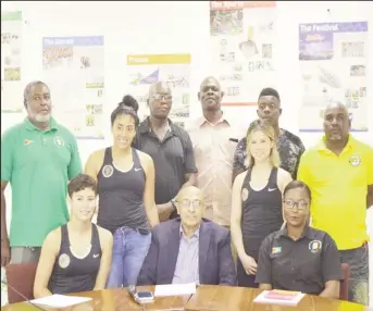  ??  ?? GOA’s President K. Juman Yassin (centre), General Secretary Hector Edwards (standing far left) and Administra­tive Secretary and Chef-de-Mission for the Pan American Games, Nalini McKoy (sitting far right) along with some of coaches and athletes who will represent Guyana in Peru.
