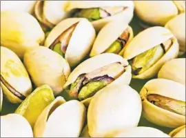 ?? Frank Krahmer Getty Images ?? PISTACHIO GROWER Assemi Bros. of Fresno estimates the value of its crop at $50 million and wants Los Angeles-based Wonderful Pistachios to shell out.