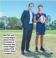  ?? ?? Ben Ikin and young league player Kasey Krywenko at Runaway Bay Junior Rugby League Club. Picture: Glenn Campbell