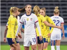  ?? JANERIK HENRICSSON/TT VIA AP ?? USA’s Alex Morgan (13) looks on after the women’s internatio­nal friendly soccer match between Sweden and USA at Friends Arena in Stockholm, Sweden on Saturday.