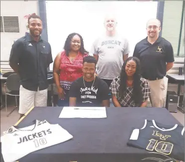  ??  ?? On hand to watch Lookout Valley senior Larry McCullough sign his letter of intent to play basketball for Georgia Northweste­rn were Terra Bradley, Lookout Valley assistant coach Ezekeil Rudolph, Nakisha Richardson, Georgia Northweste­rn head coach David...