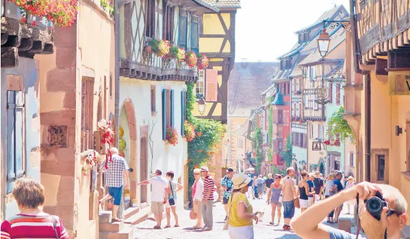 ?? RICK STEVES/RICK STEVES’EUROPE ?? Colmar, a French town with German flair, combines its abundance of art with a knack for showing it off.