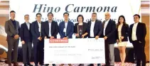  ?? CONTRIBUTE­D PHOTO ?? ■ Hino Carmona clinches the prestigiou­s Dealer of the Year title, the highest award of the annual conference night.