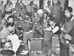  ??  ?? (From left) A session in the Constituti­on Hall on December 10, 1946 ; Jawaharlal Nehru addressing the midnight session of the Constituen­t Assembly on August 15, 1947; Counting of votes in independen­t India’s first elections on January 17, 1952.