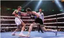  ?? Gary Carr/Inpho/Shuttersto­ck ?? Katie Taylor throws a punch but Amanda Serrano moves to avoid it. Photograph: